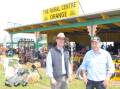 Orange Rural Centre's Phil Morrow and Michael Wright at the Australian National Field Days. Photo: DECLAN RURENGA 1021drfielddays2
