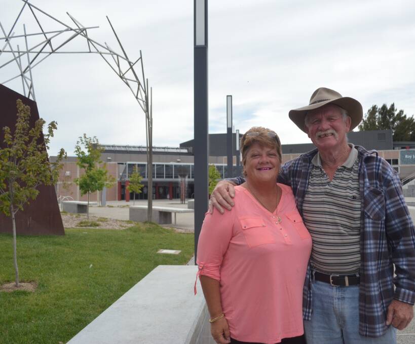 WANDERERS: Queensland's Gail and Vic Apps are spending a few days in Orange and visited the city's tourist information centre to learn about the Central West. Photo: DECLAN RURENGA 1026drtourism1