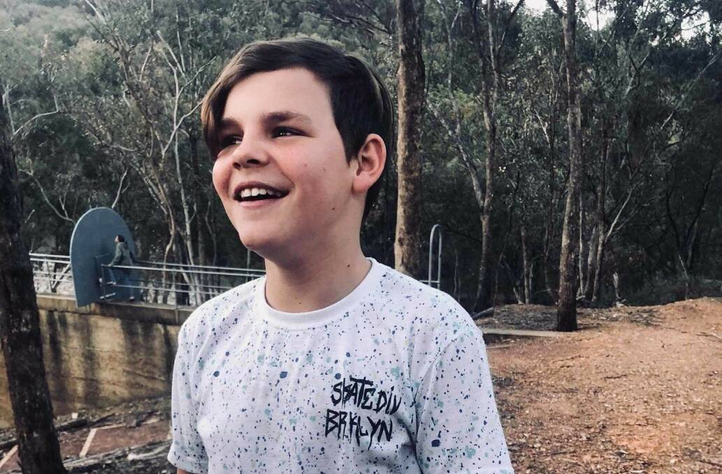 HAPPIER TIMES: Tyler Sunderland, 14, during a hike with this family. His brother Callum remember how happy Tyler was on this day. Photo: SUPPLIED