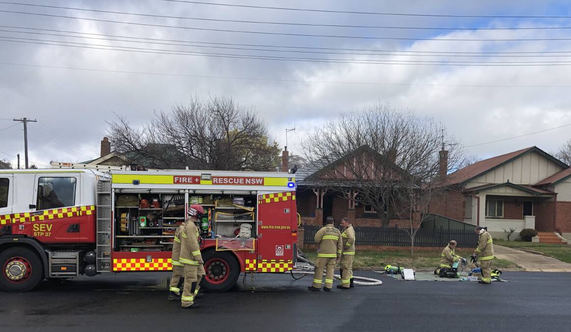 BLAZE: A woman is in hospital and her dog was saved during a house fire on Rocket Street on Monday morning. Photo: SUPPLIED