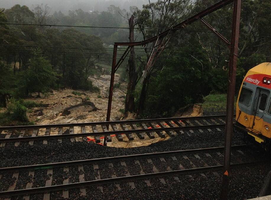 TRACK CLOSED: Landslides and bushfires have forced an immediate closure of sections of the Blue Mountains route since December. Photos: SYDNEY TRAINS