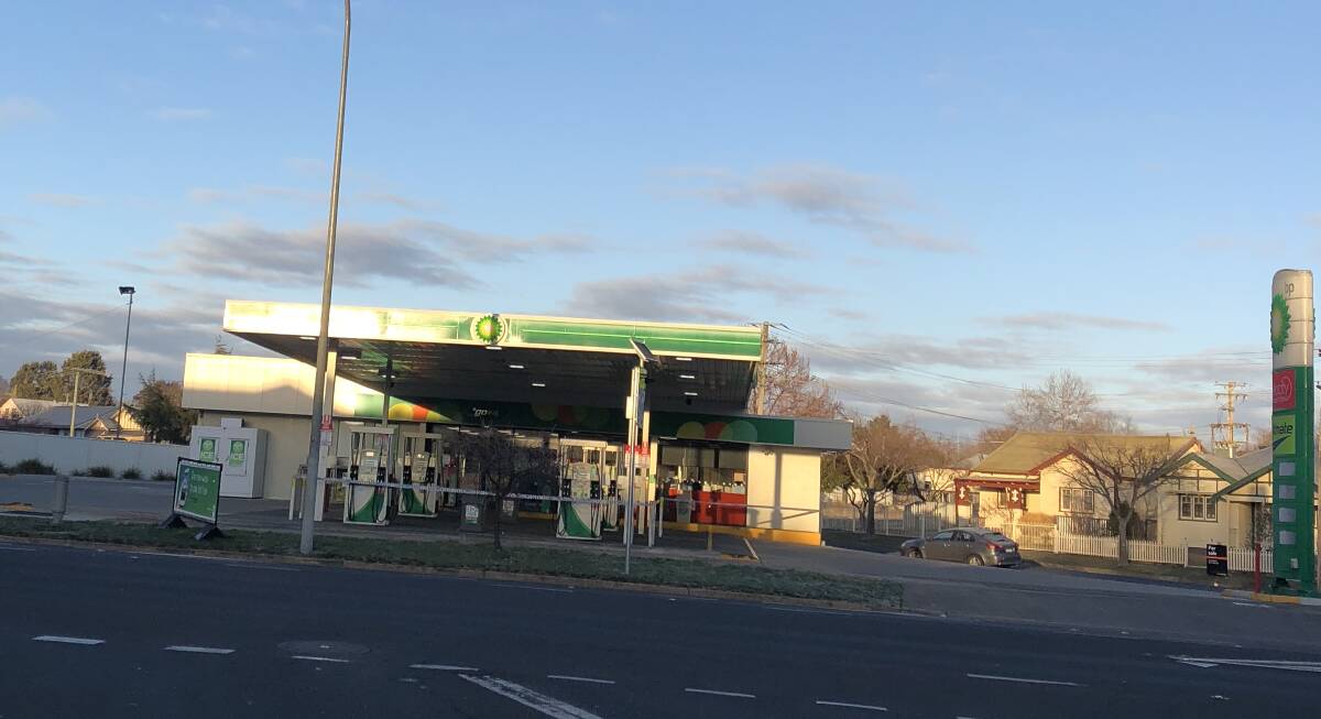 CLOSED OFF: Police tape was still up around the BP service station on the Mitchell Highway many hours after an overnight robbery. Photo: SUPPLIED