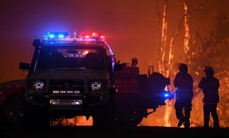 TRAGEDY: Two volunteers firefighters died on Thursday night battling a blaze that stretches from near Oberon to south-west Sydney. Photo: FILE