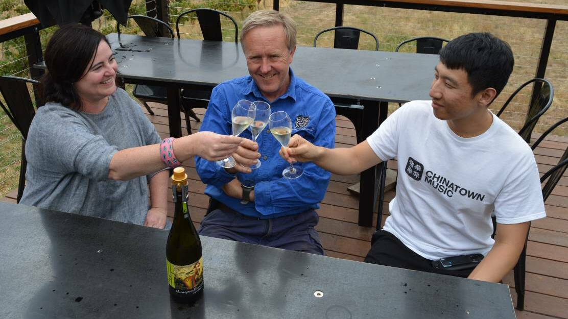 AWARD SUCCESS: Silver Compass Tours founder Kelly Picarazzi, vigneron James Sweetapple and public relations worker Brighton Liu at Cargo Road Wines. Photo: SUPPLIED