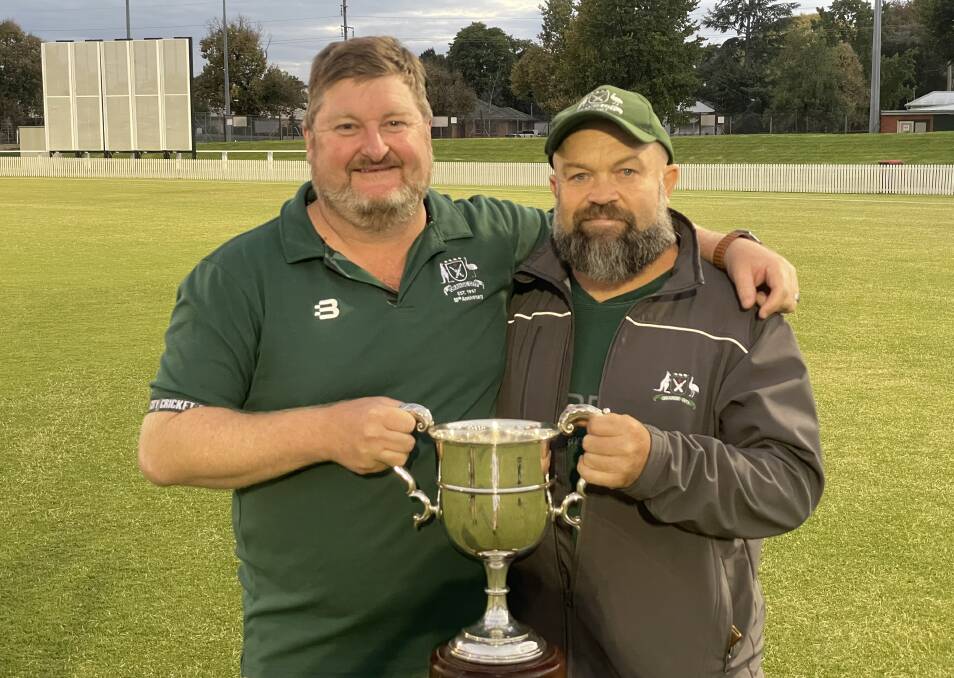 STALWARTS: Dave Boundy and Orange City club captain Jamie Stedman were extremely proud to claim the McCarthy Cup in 2021. Photo: JAKE HUMPHREYS