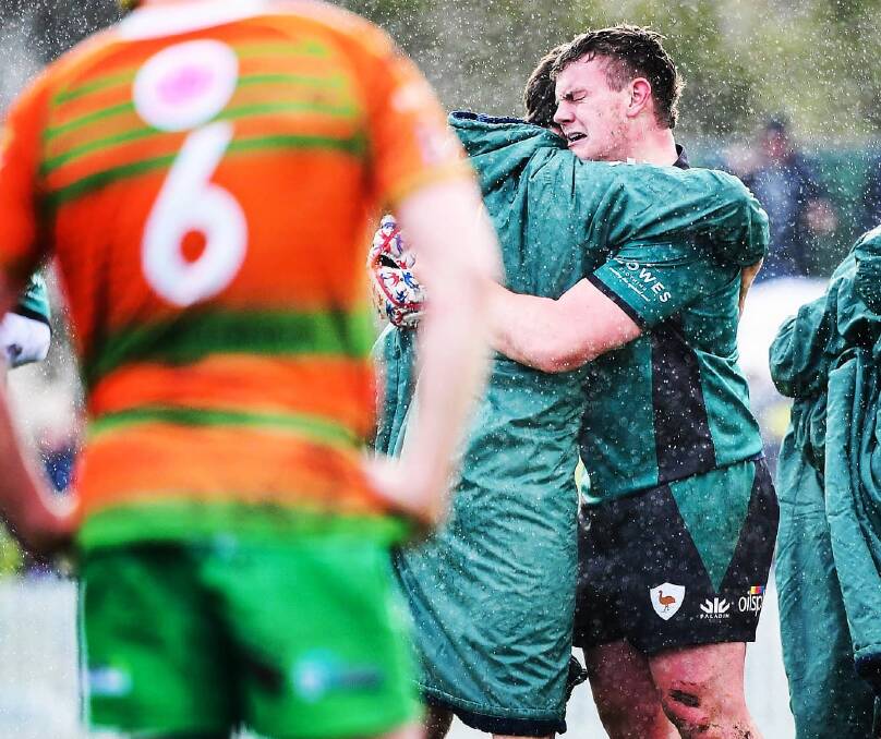 ELATED: Stannies' gun and Australian Schoolboy Jack Morrison celebrates a hard-fought win over Orange City with his teammate. Photo: STU WALMSLEY