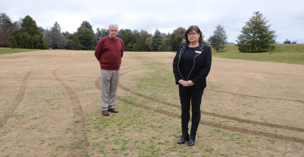 UNHAPPY: Duntryleague's president John Cook and secretary Michelle Carroll are disappointed by what vandals have done. Photo: JUDE KEOGH.
