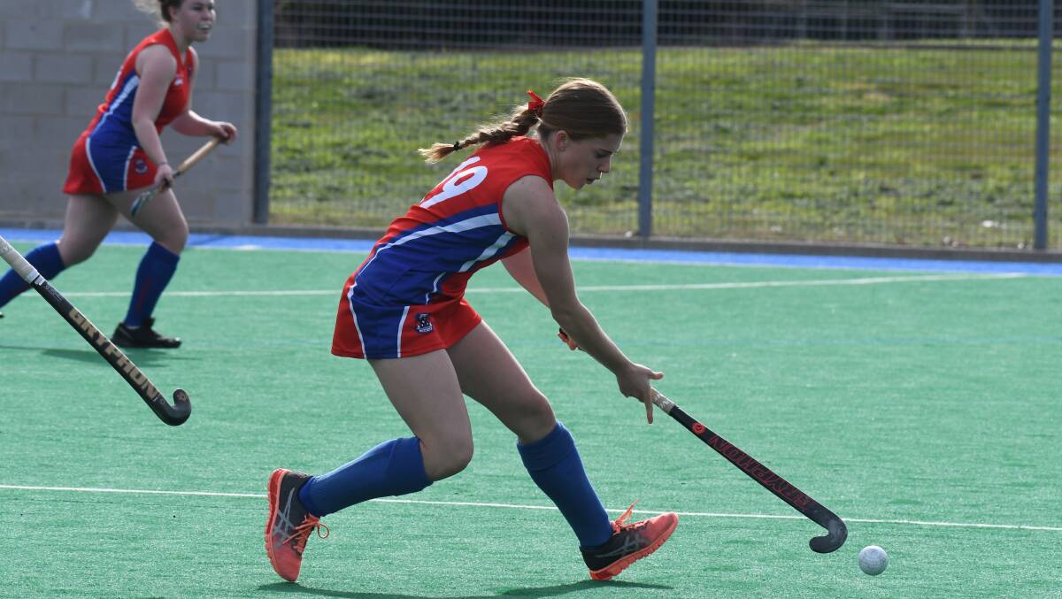 NONE FROM THREE: All Orange sides fell in their first Premier League Hockey clashes on Saturday. Take a look at Confederates and Ex-Services action. Photos: JUDE KEOGH