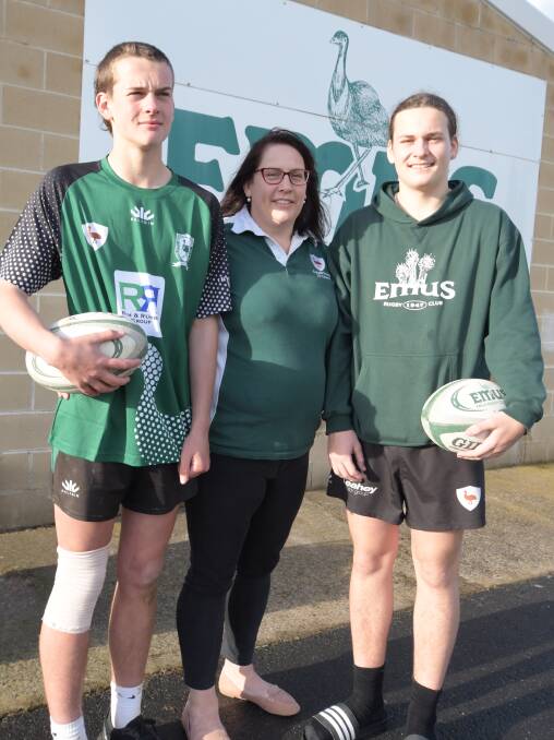 MASSIVE MOMENT: Jack Holland, Keryn Phillips and Bailey Holland will be hoping the Emus' junior grand final sides go two-for-two on Saturday. Photo: JUDE KEOGH