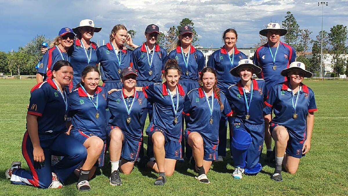 WE DID IT: The Western under 16s celebrate their Country Championships title on Tuesday.