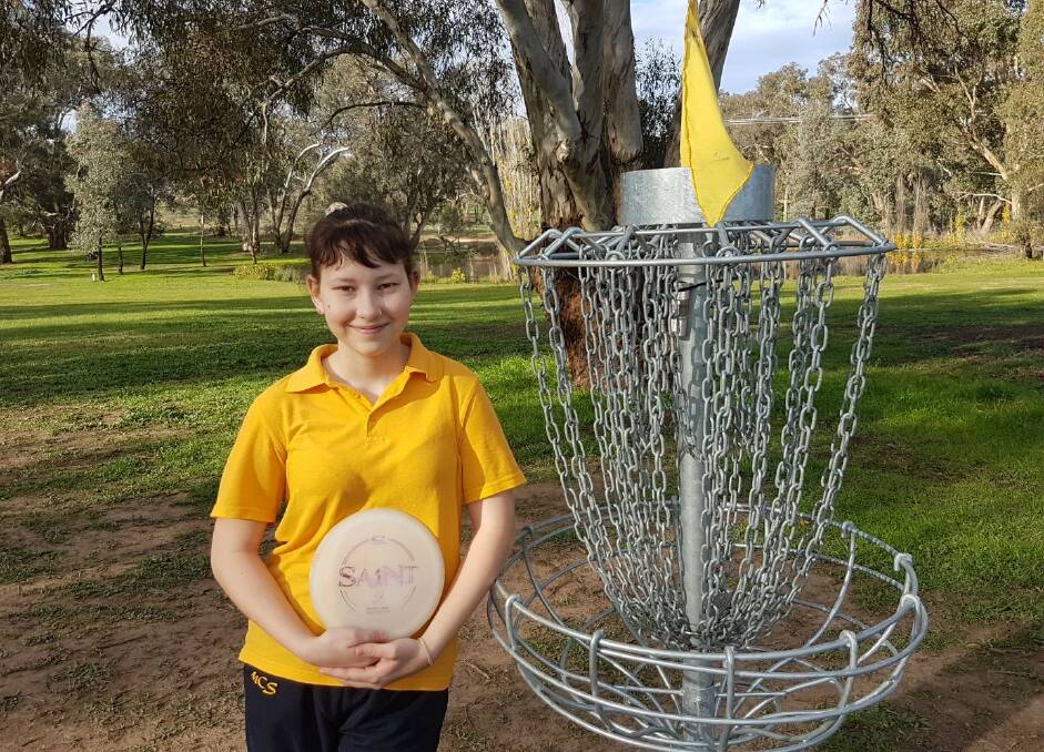 HOOKED: After less than a year of practice, Claire Neville is head over heels for disc golf. She's got her sights set on the next competition set to be held in October. Photo: SUPPLIED