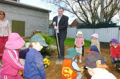 DIGGING DEEP: Geoff Kingswood from Austar gets his hands dirty planning fundraising efforts for Manildra Preschool.Photo: STEVE GOSCH
