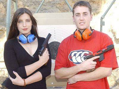 YOUNG GUNS: Rebel Lindsay-Egan and Mitchell Meredith are two of the Orange and District Pistol Club's younger members who are climbing the shooting ranks. Photo: ADAM TUDOR