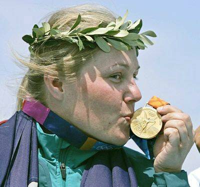 GOLDEN GIRL: Orange’s Suzy Balogh kisses her gold medal after winning the women’s trap event in Athens at her first Olympic Games.