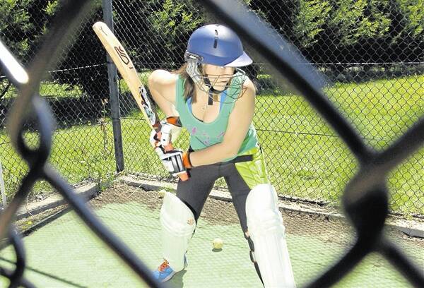 GAME ON: Addie Johnson gets her eye in ahead of next week’s Cricket Australia Under 18 Women’s Championships. Photo: STEVE GOSCH