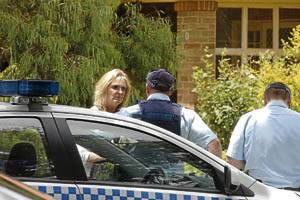 COUNSELLING:  Nurses’ Association western region organiser Linda Griffiths talks with police. Nurses were offered counselling yesterday.