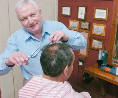 CLEAR-CUT WINNER: Hotel Canobolas barbershop proprietor Lindsay Totman has been honoured by the Rotary Club of Orange Calare for pride in his workmanship.