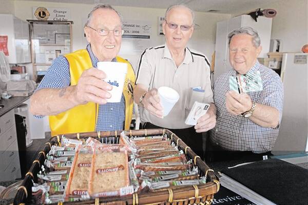 SAFE TRAVELS: John Pritchard, Les Brown and Ray Sharpe this year helped keep drivers alert over the Christmas period at Driver Reviver on Bathurst Road.  Photo: STEVE GOSCH   1223sgdriver2