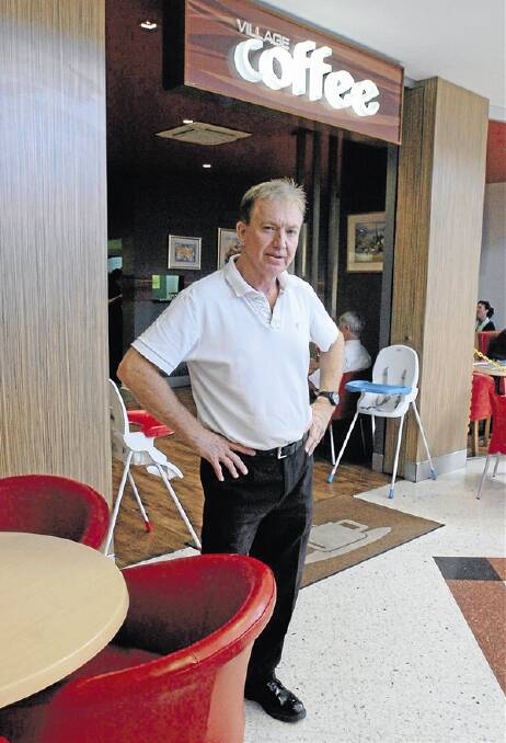 DISAPPOINTED AT NEW LAWS: Village Coffee Shop owner Peter Ryan. Photo: STEVE GOSCH 0329sgbusiness1