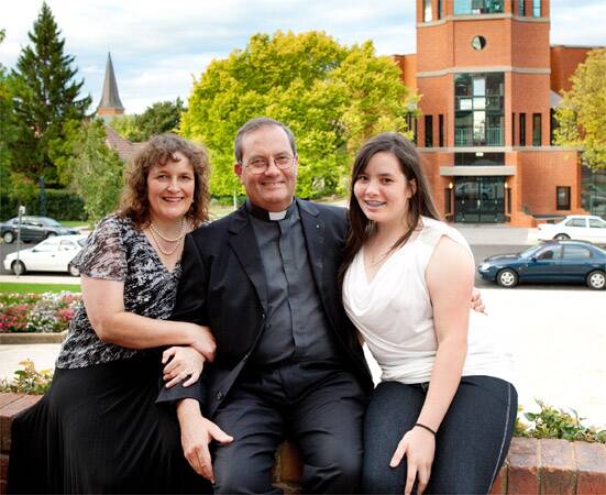 NEW APPOINTMENT: Dean Andrew Sempell, of All Saints' Cathedral, has announced he has been accepted as the 16th Rector of St James' Church, King Street in Sydney. He is pictured with his wife Rosemary and daughter Kate.           031410sempell