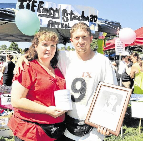 FOR TIFFANY: Donna and Harry Stedman at their stall to raise funds to help with expenses for their critically injured niece Tiffany.