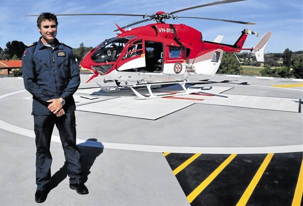 LIE OF THE LAND: Pilot Ben Volkovsky on the Orange hospital helipad last year.