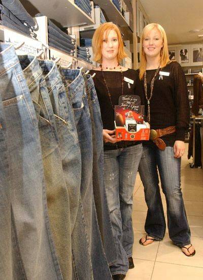 DAY FOR JEANS: Cassandra Winter and Angie Kloosterman from Jeans West with Jeans for Genes Day merchandise. Photo: TRACEY SHARP