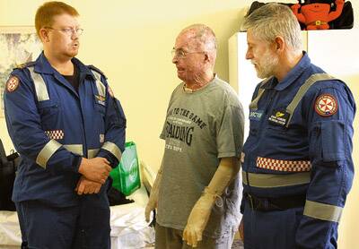 THANK-YOU: Bernie Schulte thanks intensive care paramedic Nathan Croft and Dr Gavan Schneider who were first on the scene when he was critically burned in a bushfire on the family property last summer.