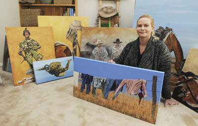 LIFELONG DREAM: Local artist Amber Martin surrounded by work she'll exhibit at the Australian Stockman's Hall of Fame.