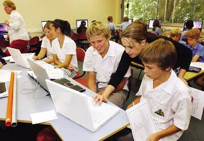 ONLINE LEARNING: Students Ali Clarke, Amanda Clothier, Angus Parsons and Connor Peterson, with teacher Leanne Dixon, will participate in a virtual opportunity class for students in Western NSW. Below: Students Jason Bowkett and Hayden Westcott use the online program.
