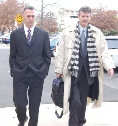 HEARING: Former police detective Brad Hosemans (left) walks towards Orange Court House with his solicitor for the first day of the Police Integrity Commission public hearing. Photo: JUDE KEOGH               0605crt17