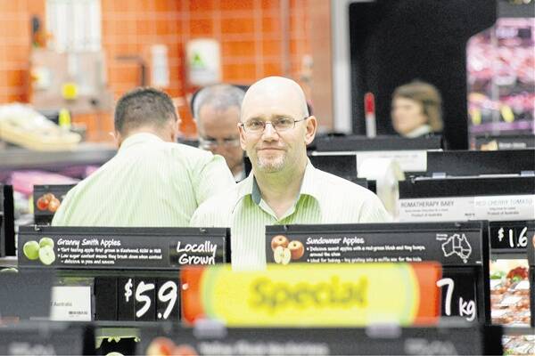 GRAND OPENING: North Orange Woolworths store manager Michael Toholke is expecting a busy day when the store opens its doors this morning. Photo: MARK LOGAN 1130mlwoolies7
