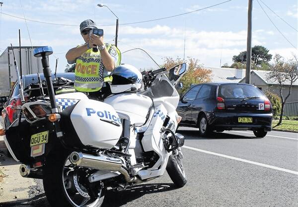 EASTER SLOW DOWN: Traffic and Highway Patrol Command sergeant Peter Foran said police will be out in force on the region’s roads this Easter long weekend. Photo: NADINE MORTON          0405nmbike3