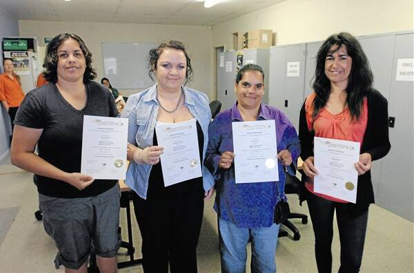 LATEST GRADUATES: Birrang Enterprises’ latest graduates Loretta Ah-see, Terileigh Vincent, Susan Rose and Joanne Smyth completed three units of the Certificate III in Business Administration yesterday. Photo: STEVE GOSCH