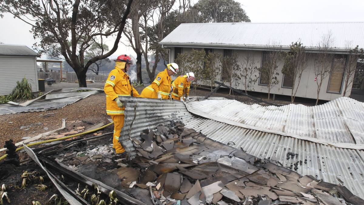 Aftermath of the fires in Catherine Hill Bay. Photo: PETER RAE