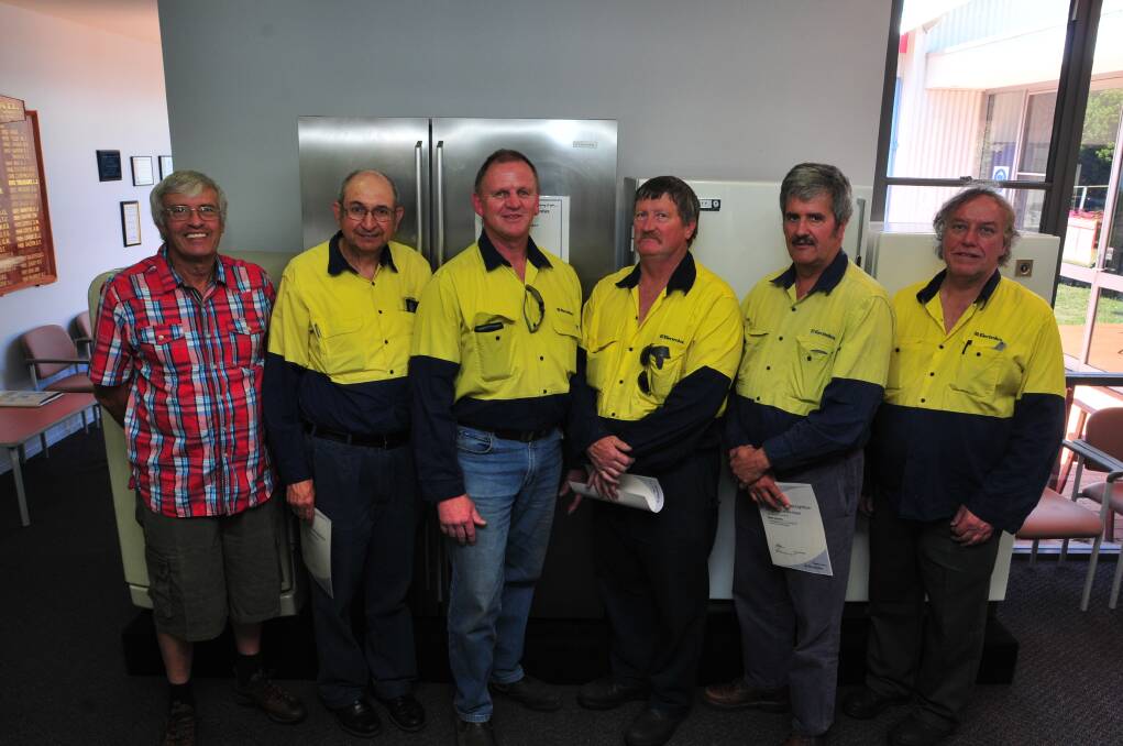LONG TIME: Maurice Aplin, Vincent Moses, Phil Alexander, David Bevan, Brian Johnson and Lyle Griffin have each clocked up 40 years at the Orange Electrolux plant. 