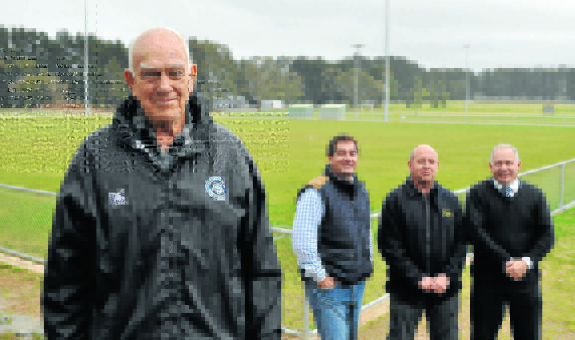 DOWN TO EARTH: Bernie Stedman, pictured with Orange District Football Association president Tony Mileto and Orange councillors Jason Hamling and Jeff Whitton, will have field No.5 at Sir Jack Brabham Park re-named Stedman Field following more than 60 years of involvment in the sport. Photo: NICK McGRATH 		              0807nmfield2