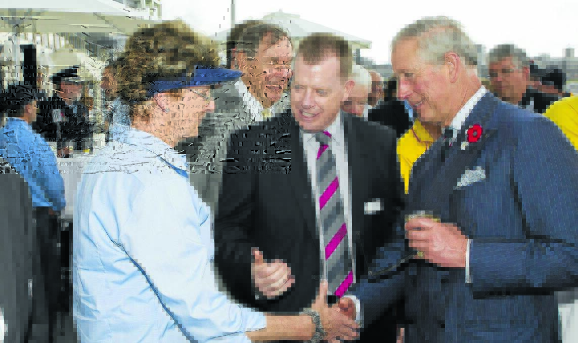 ROYAL HANDSHAKE: Orange woman Lynne Middleton met Prince Charles at a special event in Bondi, thanks to her long-standing role with Royal Life Saving.  1119prince3