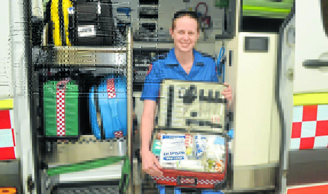 SAVING LIVES: Orange paramedic Meredith Stewart knows the importance of first aid skills. Orange’s paramedics are leading a push for everyone to brush up on their skills or learn what to do in an emergency. Photo: LUKE SCHUYLER 	  1122lspara1