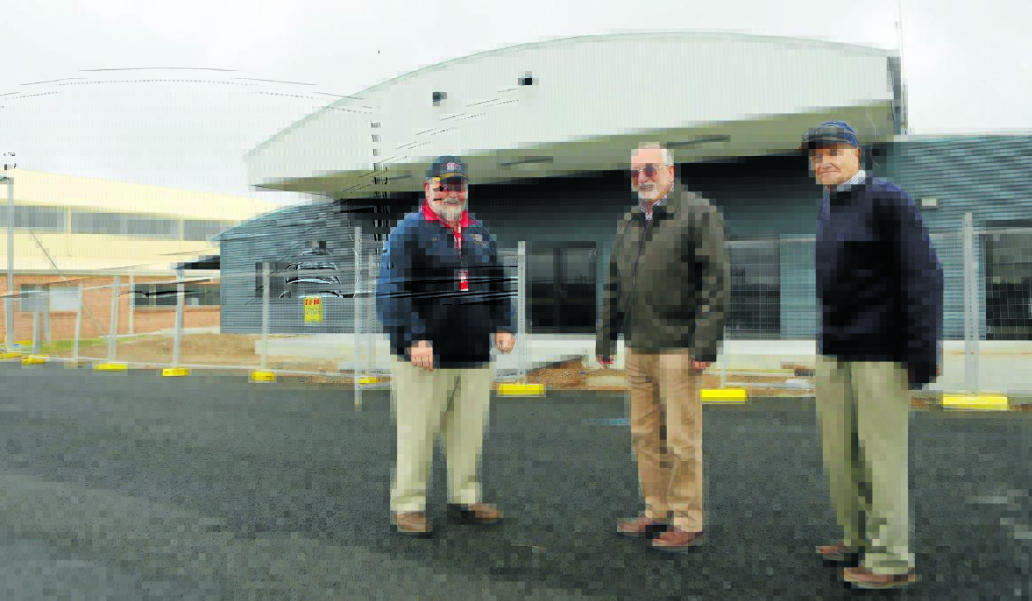 FLYING HIGH: Max Hazelton Aero Centre chairperson Bob Nash, Orange Aero Club president Phil Robertson and committee member Dr Stuart Porges outside the centre a couple of weeks ago.