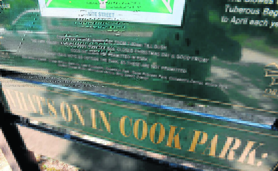 CLOSING TIME: Signs on Cook Park state patrons must leave at dusk.