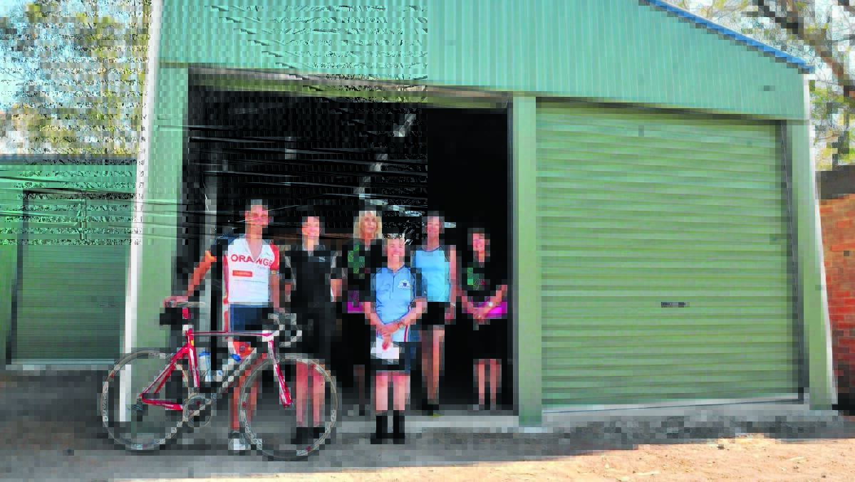 TEAM WORK: Orange Triathlon Club president Steve Martin, Aspire program manager Tina Weller and Dragons Abreast members Mary Sheldon, Pearl Butcher, Ros Kemp and Gail Wright are excited about their new edition at Lake Canobolas. Photo: JUDE KEOGH                                                                                                                    	     0118lakeshed1