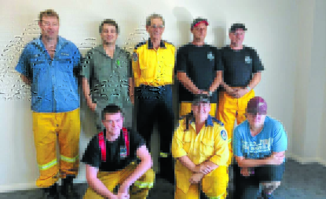 HERE TO HELP: NSW Rural Fire Service Canobolas Zone volunteers from Orange and Cowra (back) Matt Reyter, Mark Gray, Glen Griffith, Tony Mehmed, Andrew Vale (front) Josh Pedley, Paula Harding and Cheryl Kinghorn flew to South Australia on Saturday to help with the bushfire emergency. Photo: NILS WAITE contribued