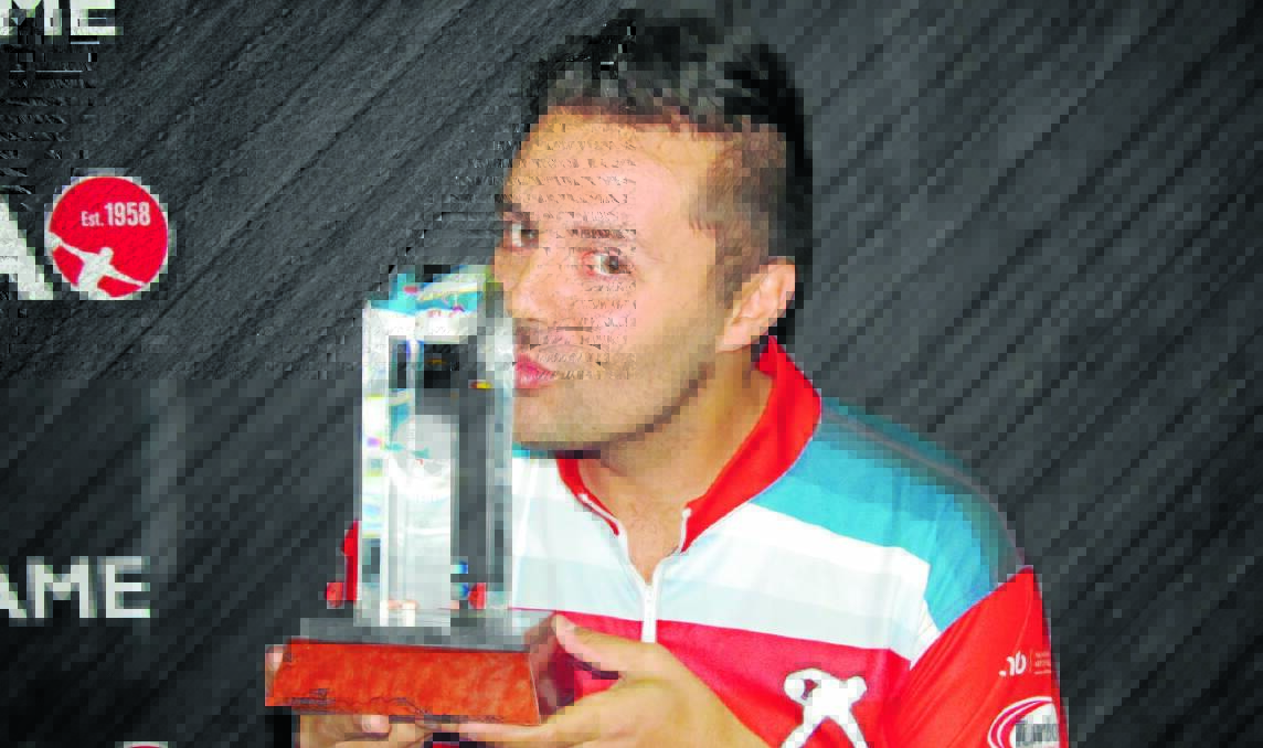 ON TOP OF THE WORLD: Orange’s Jason Belmonte with the 2012-13 Professional Bowlers Association Player of the Year Award, which he received on Saturday (AEDT).  Photo courtesy of pba.com