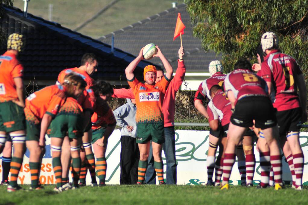 HERE IT COMES: City hooker Josh Tremain prepares to throw the ball in during a line-out against Parkes.