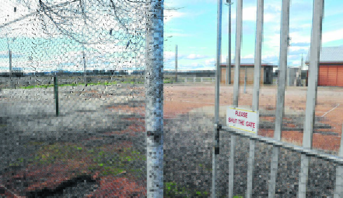 BALL IN COMMUNITY’S COURT: The tennis courts near the Borenore Railway Station have seen better days but could be overhauled if the community is able to take back control of the station.              Photo: JUDE KEOGH 0711borenoretennis1