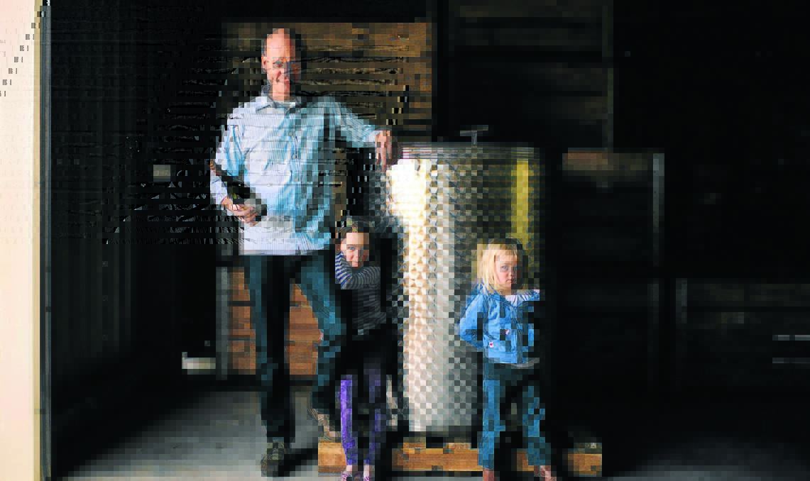 TAXING TIMES: Cider Australia president and owner of Small Acres Cyder James Kendell, with his children Tillia and Mia, says the traditional cider industry can’t withstand a large tax hike. 