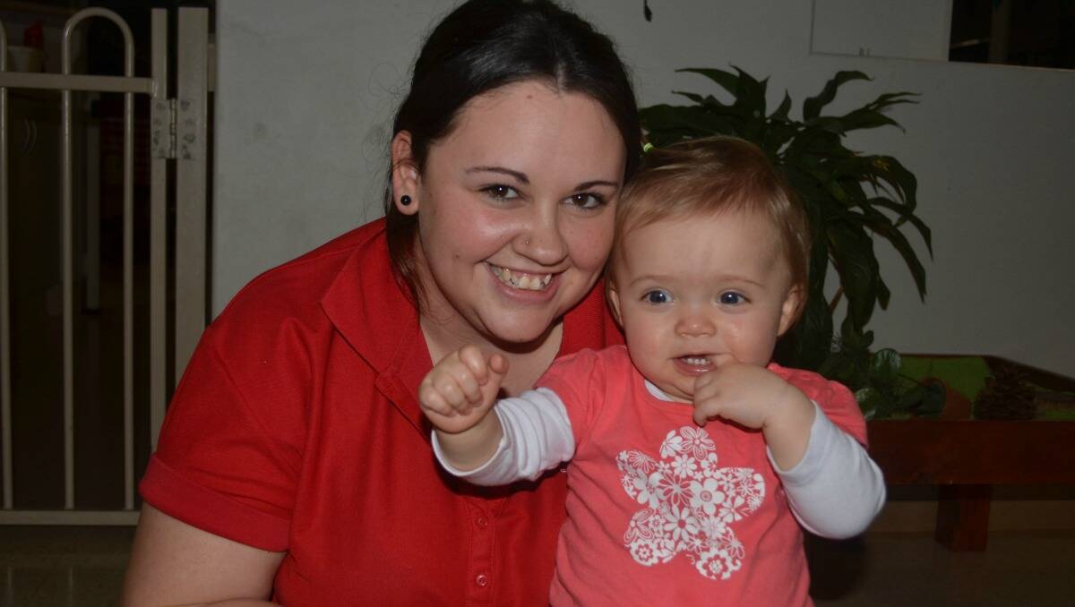 PLAYING FOR PITTANCE: Waratah Early Learning Centre employee Bek Bentley spends time with Scarlett Purvis