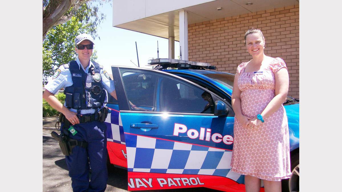 PARKES: Lachlan Highway Patrol Sergeant Dearne Jeffree and Parkes Road Safety and Injury Prevention Officer, Melanie Suitor are warning motorists to take care on the roads over the festive season.