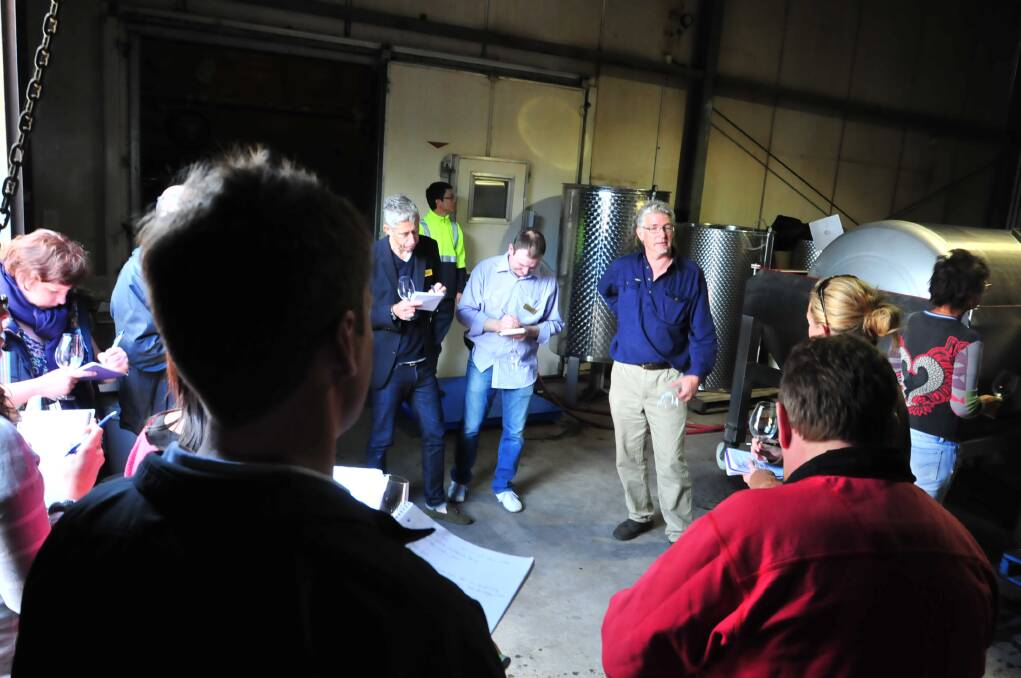 Charlie Svenson talks to visitors at his winery. Photo Jude Keogh